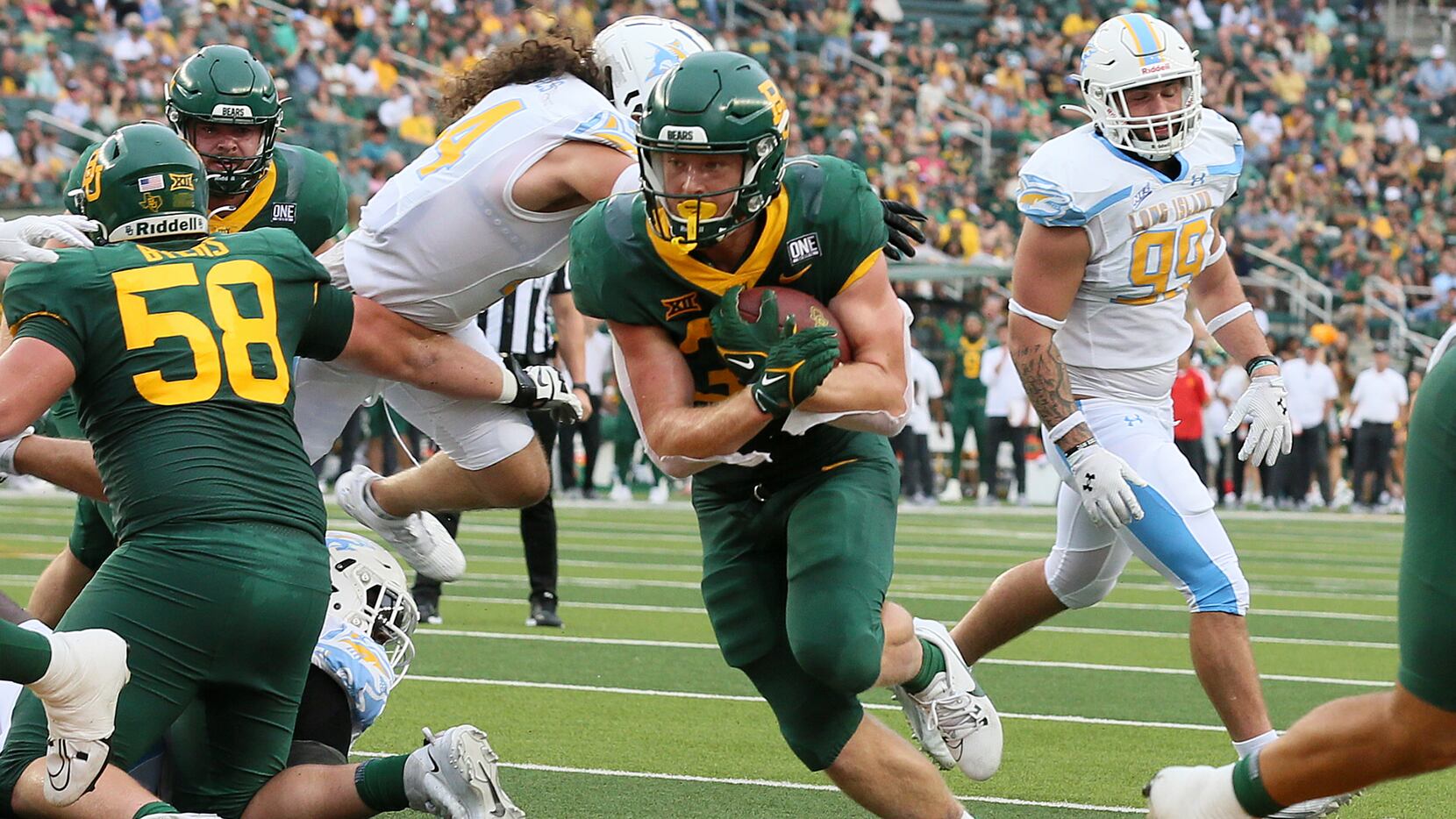 Baylor running back Dawson Pendergrass (35) scores against Long Island during the first half...