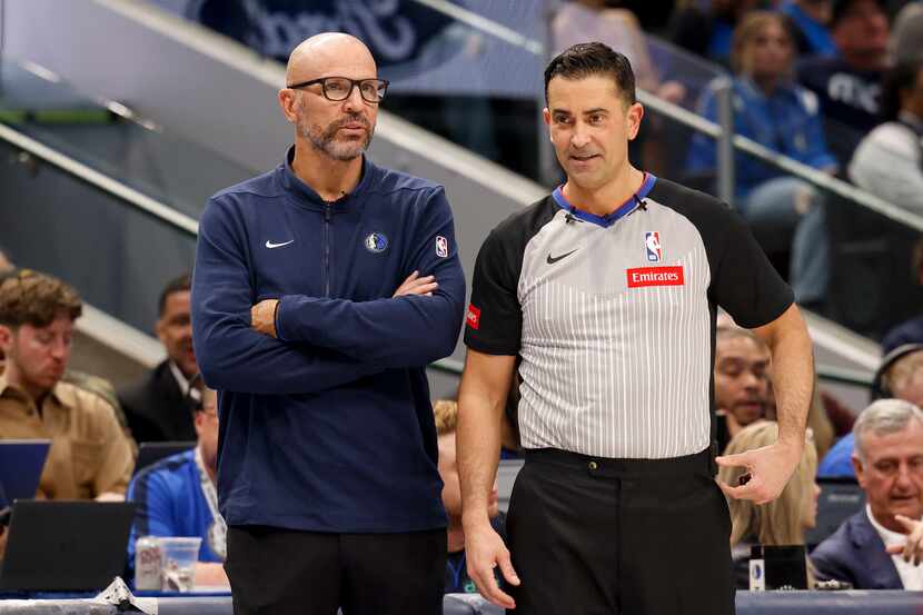 Dallas Mavericks head coach Jason Kidd talks with referee Zach Zarba (15) during the first...