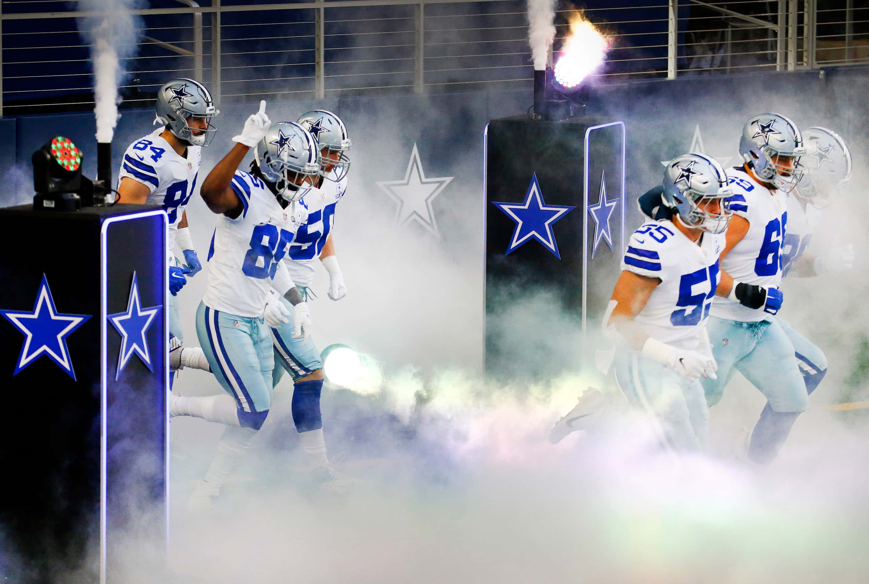 The Dallas Cowboys football team takes the field to face the San Francisco 49ers at AT&T...