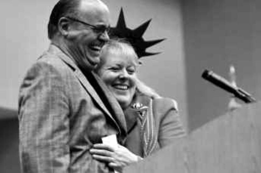 Radio talk host Mark Davis hugs Ginni Thomas, wife of Supreme Court Justice Clarence Thomas,...