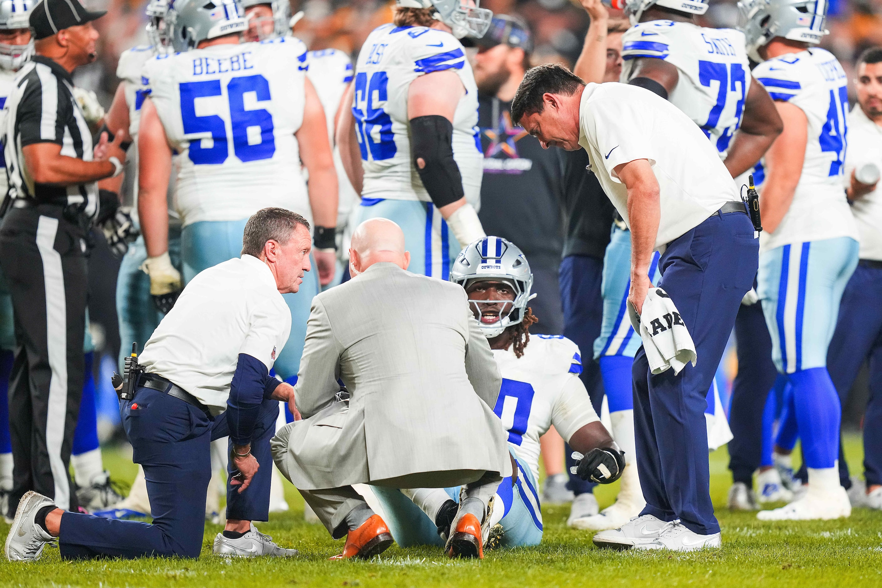 Dallas Cowboys offensive tackle Tyler Guyton (60) receives attention after being injured...