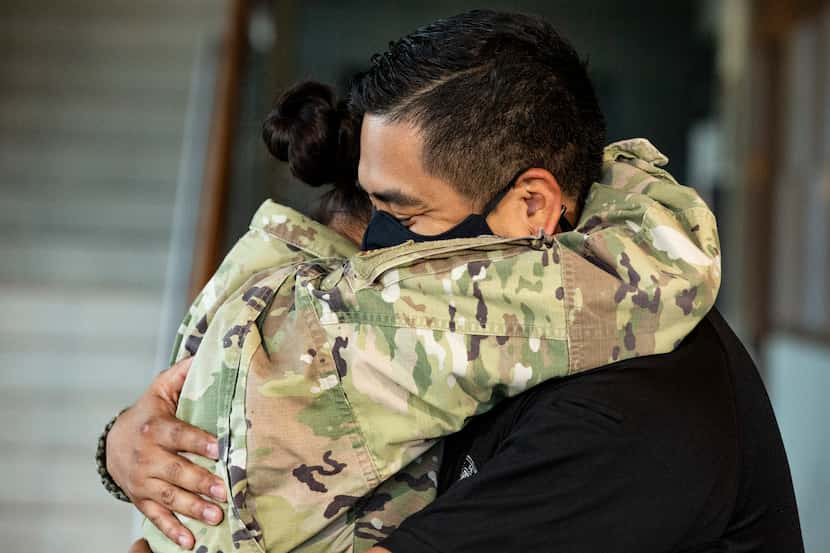 What else but a long hug upon the realization that your wife is safely home? Grand Prairie...