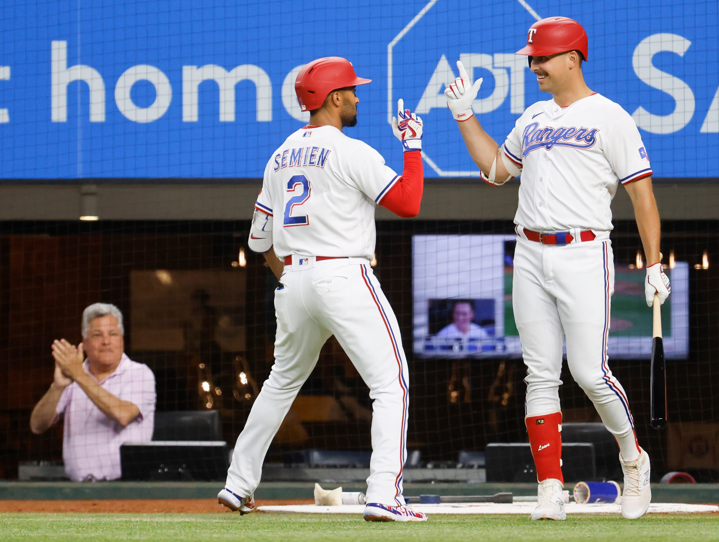 Texas Rangers second baseman Marcus Semien (2) and Texas Rangers first baseman Nathaniel...