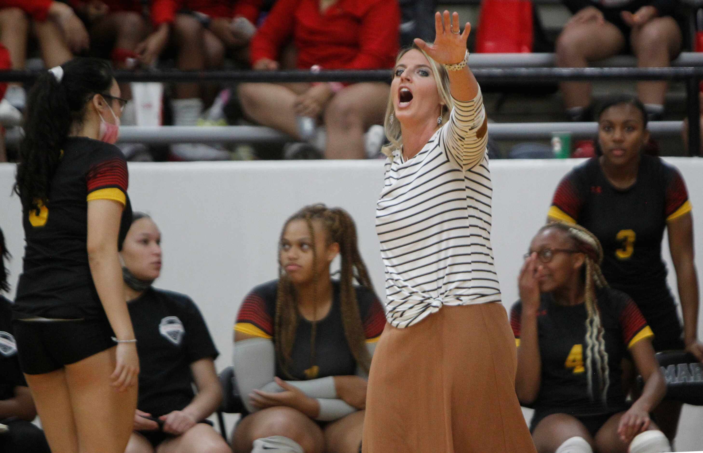 South Grand Prairie head coach Lindsay Fallen reacts to a call during the 3rd set of their...