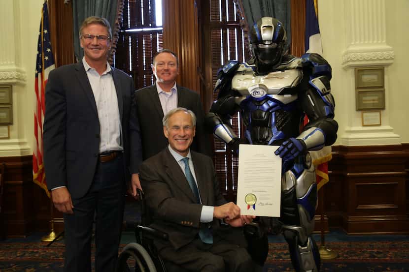 Texas Gov. Greg Abbott (center) made a proclamation declaring this Friday and Saturday...