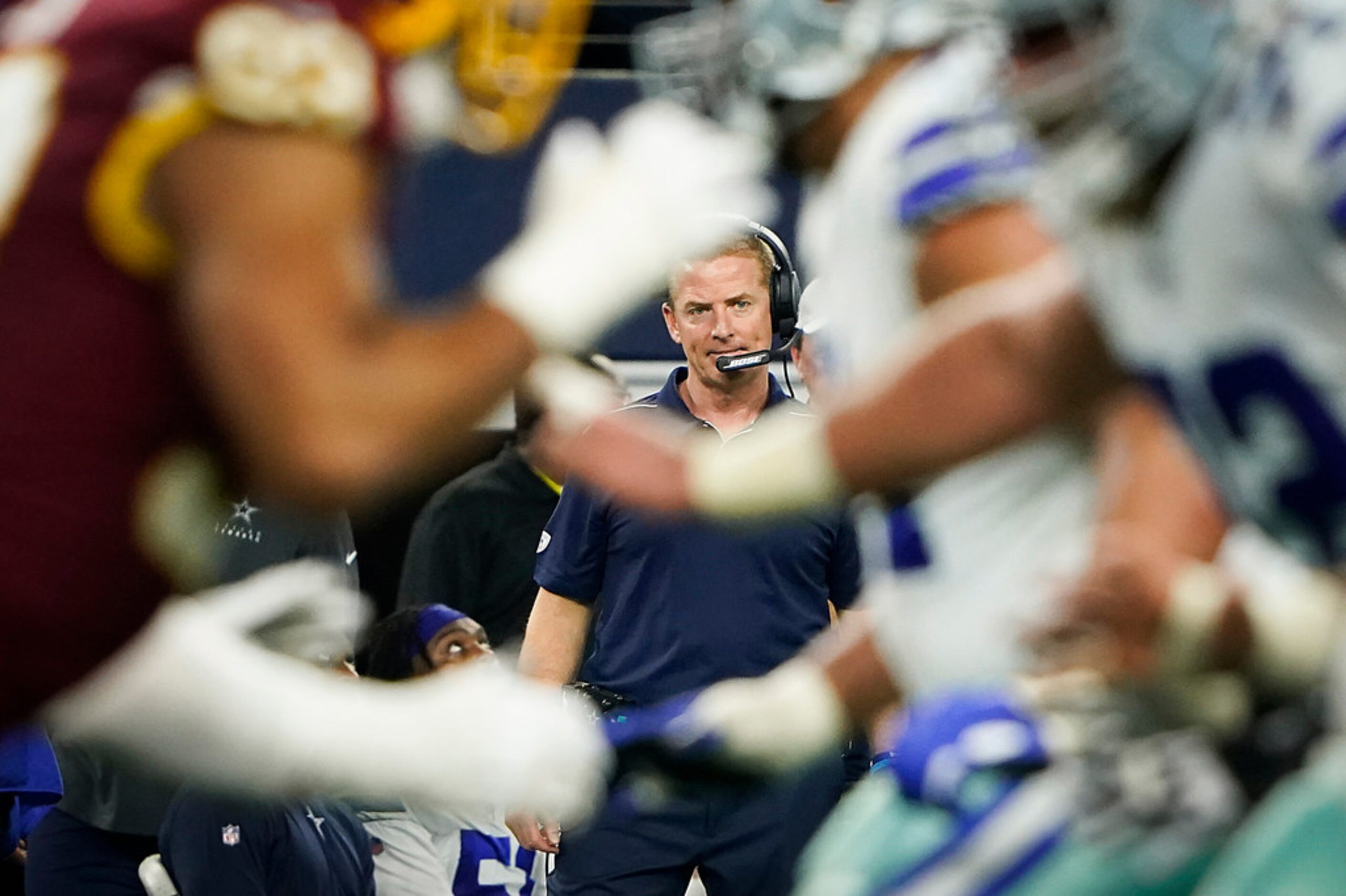 Dallas Cowboys head coach Jason Garrett watches from the sidelines during the second half of...