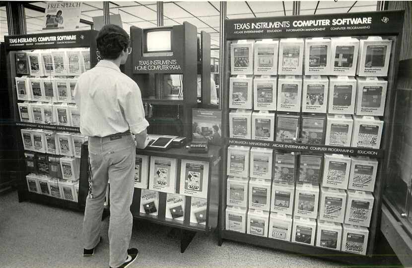 October 29, 1983: A customer looks through some Texas Instruments software items