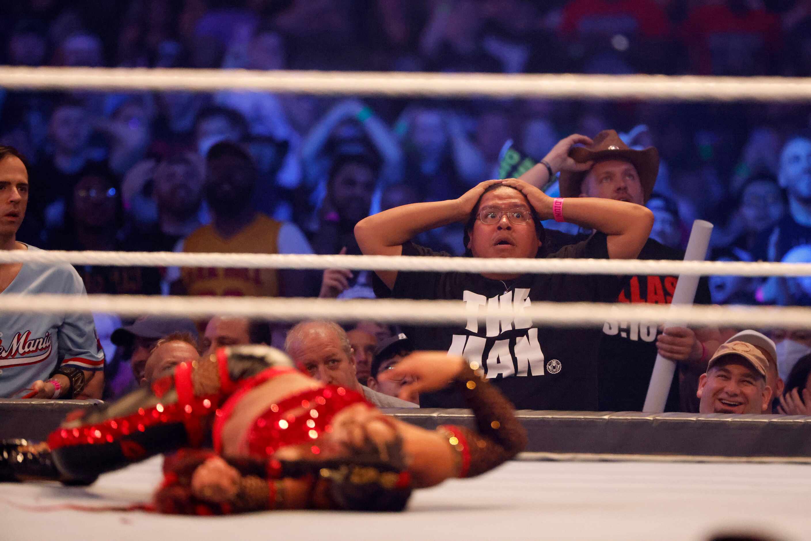 A fan reacts to a near pin on Bianca Belair by  Becky Lynch during WrestleMania in...