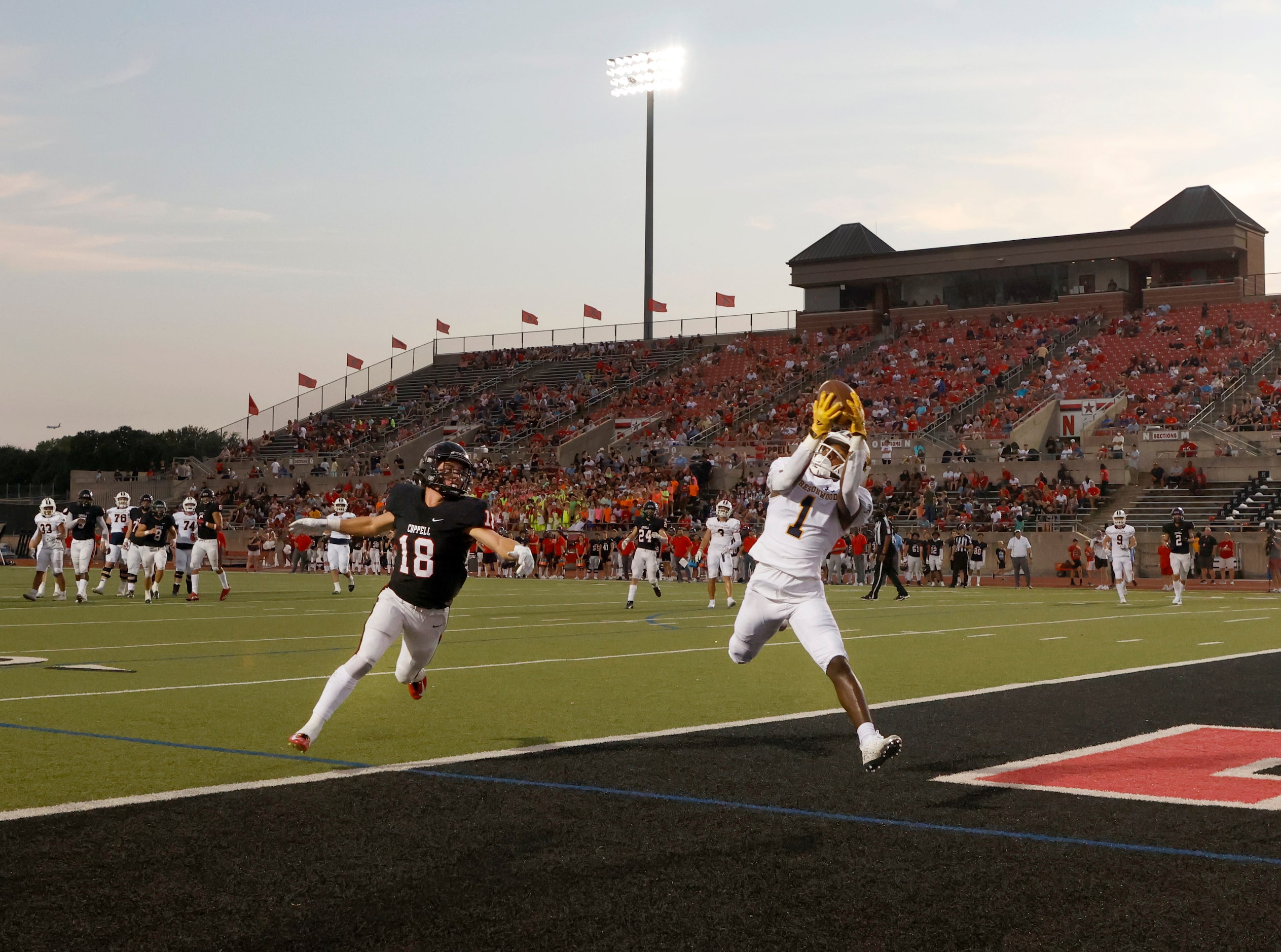 Prestonwood Christian Academy receiver Nate Stafford (1) makes a touchdown reception in...