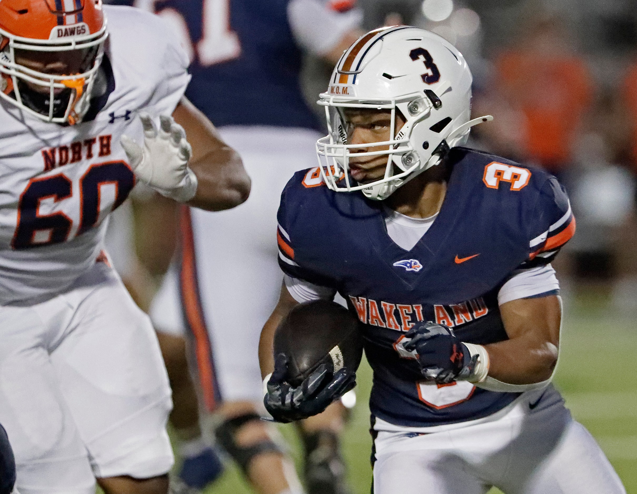 Wakeland High School running back Aidan Poole (3) looks for room to run during the first...