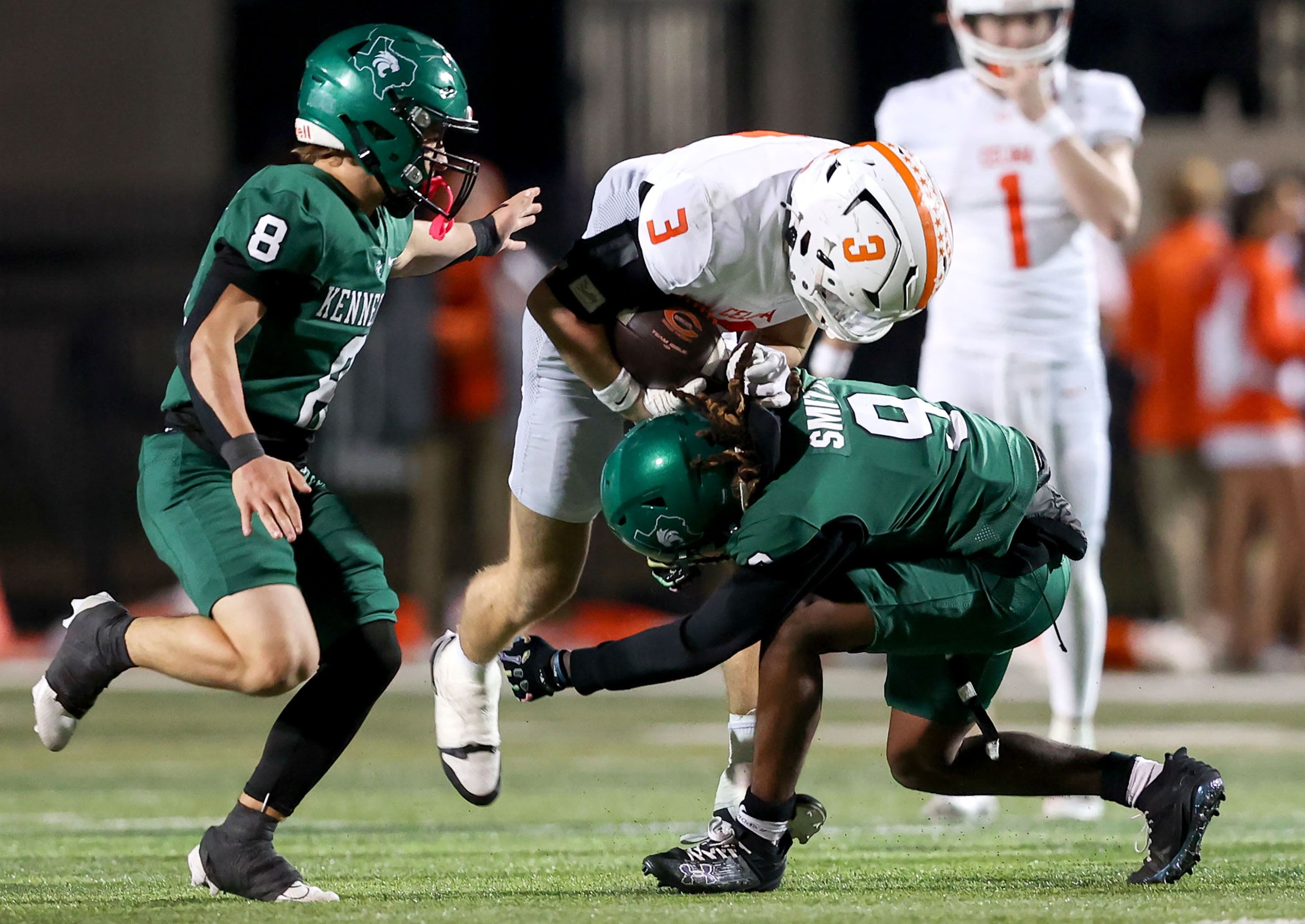 Celina running back Logan Gutierrez (3) is stopped after a nice gain by Kennedale cornerback...