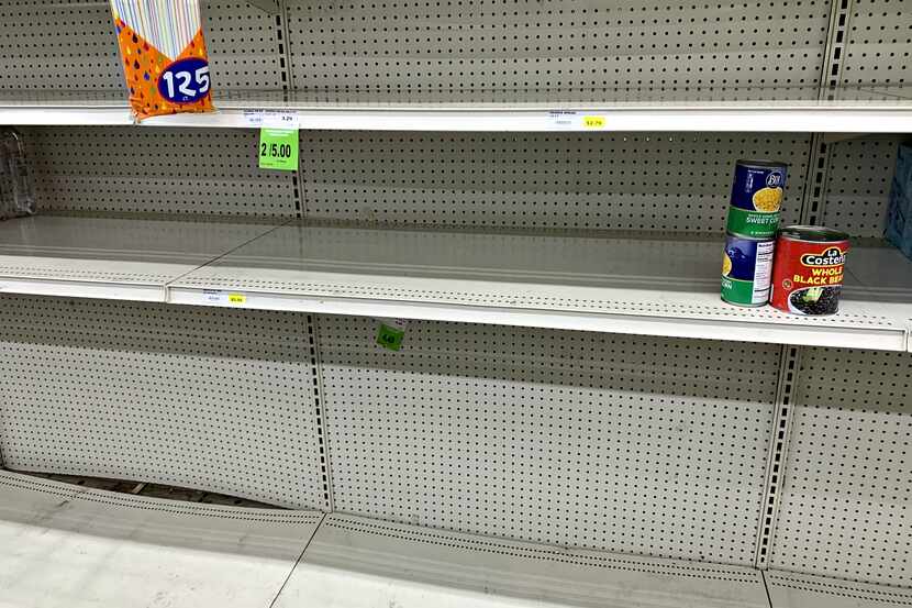 Empty shelves at the Rio Grande Latin Market on Webb Chapel Road in northwest Dallas Friday...