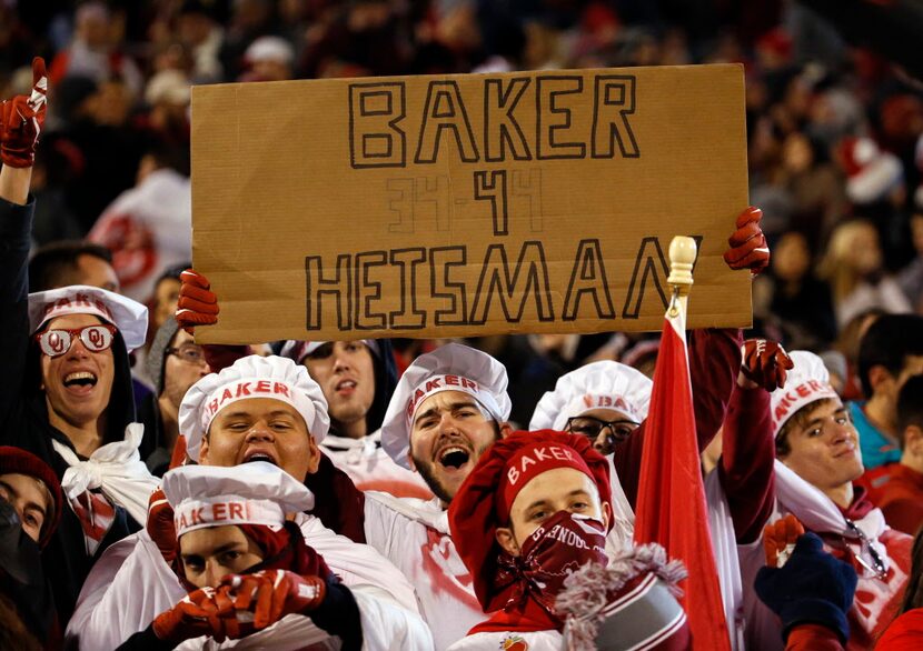 Nov 21, 2015; Norman, OK, USA; Fans of Oklahoma Sooners quarterback Baker Mayfield (6)...