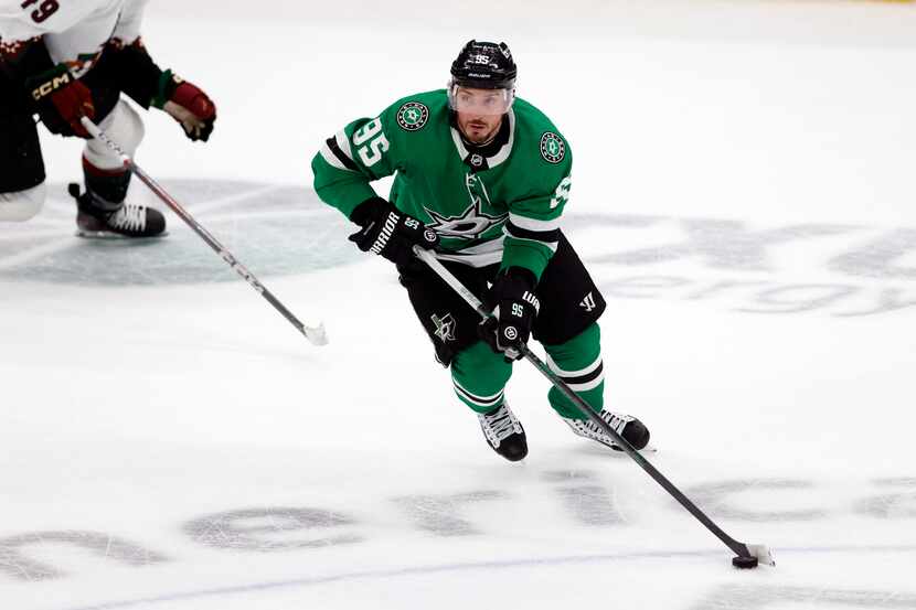 Dallas Stars center Matt Duchene (95) skates with the puck during the third period of an NHL...