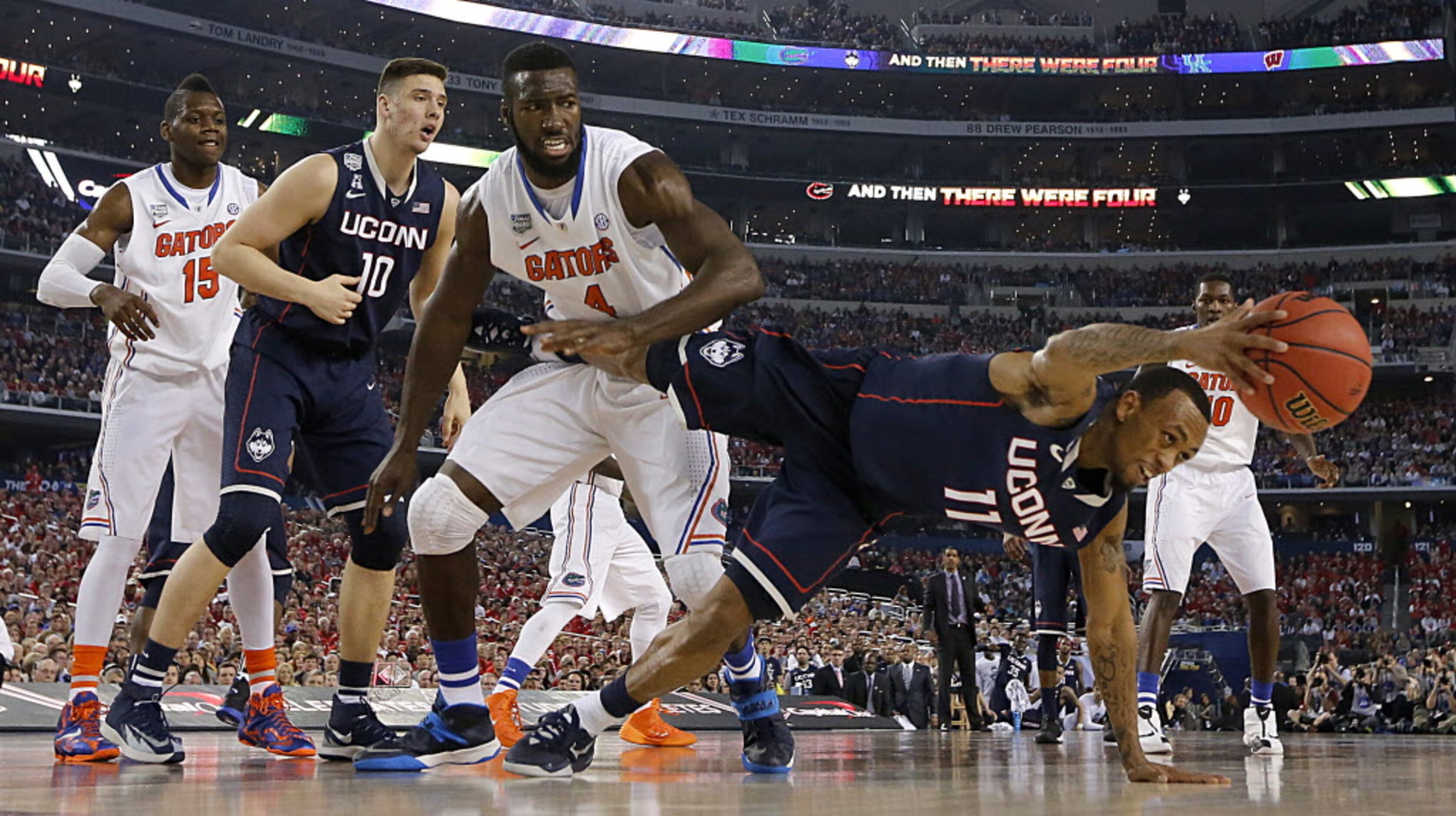 Connecticut Huskies guard Ryan Boatright (11) goes to the floor to save a defensive rebound...