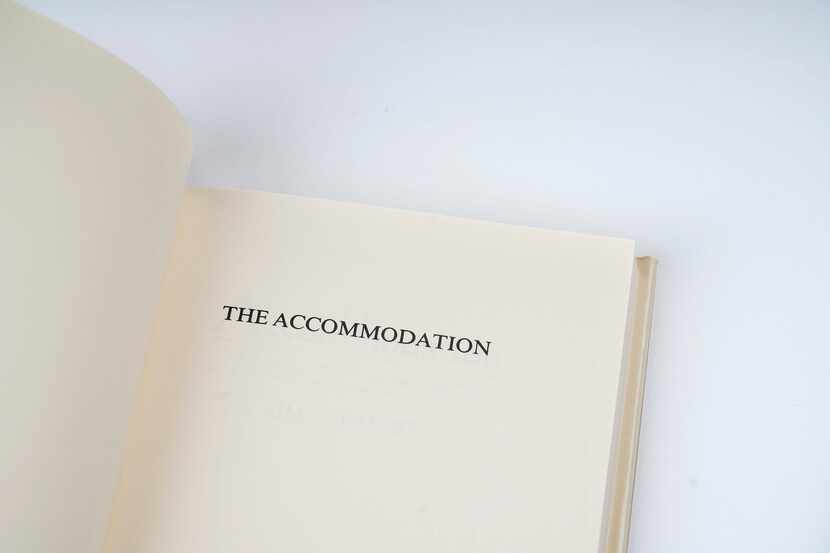 A first edition copy of 'The Accommodation,' by Jim Schutze, photographed on June 25, 2020.
