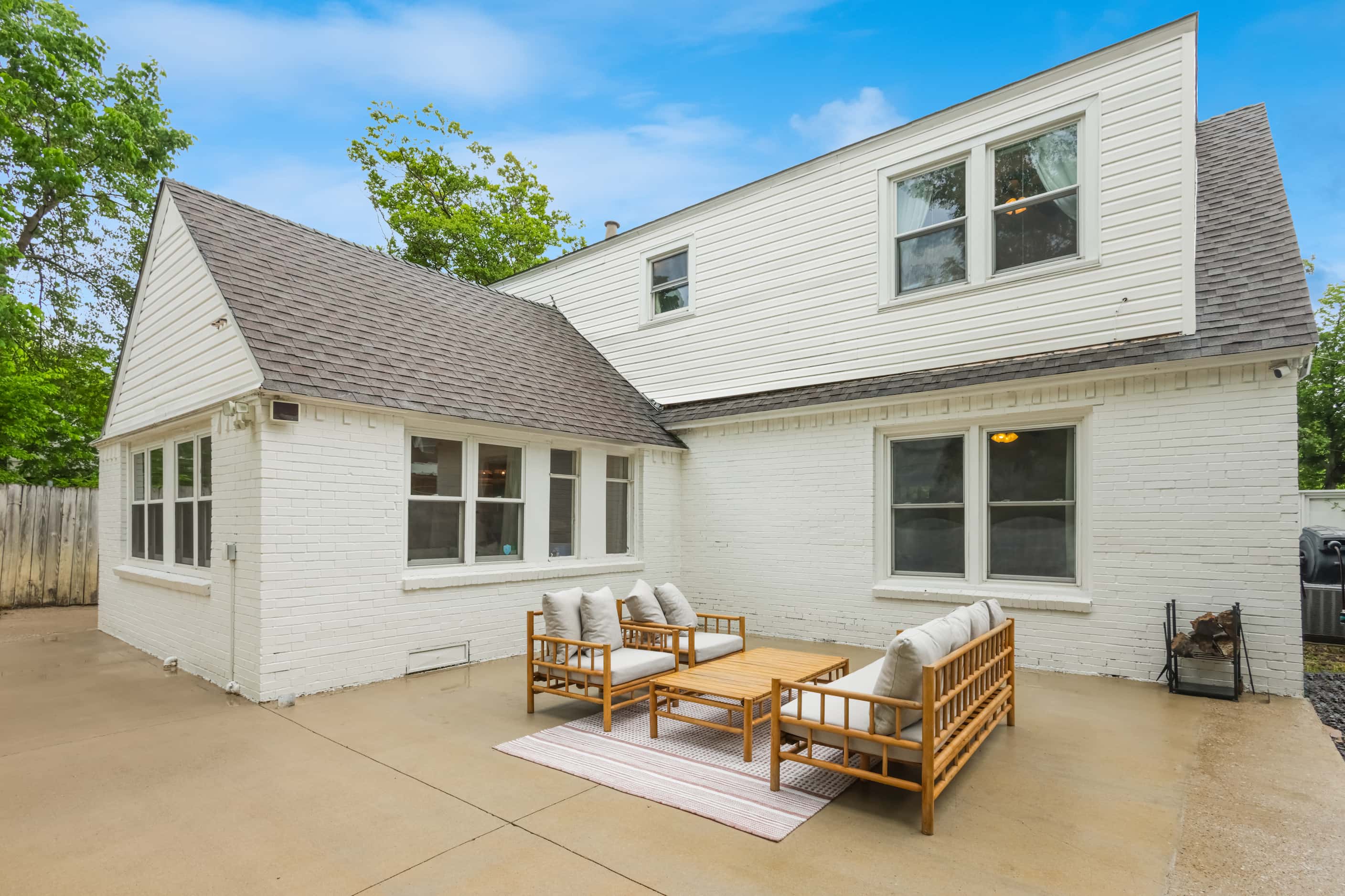 The home's fenced backyard has a large patio, plus a play area and a garage that can be...