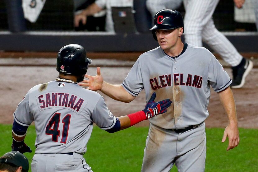 NEW YORK, NY - OCTOBER 09:  Carlos Santana #41 of the Cleveland Indians celebrates after...