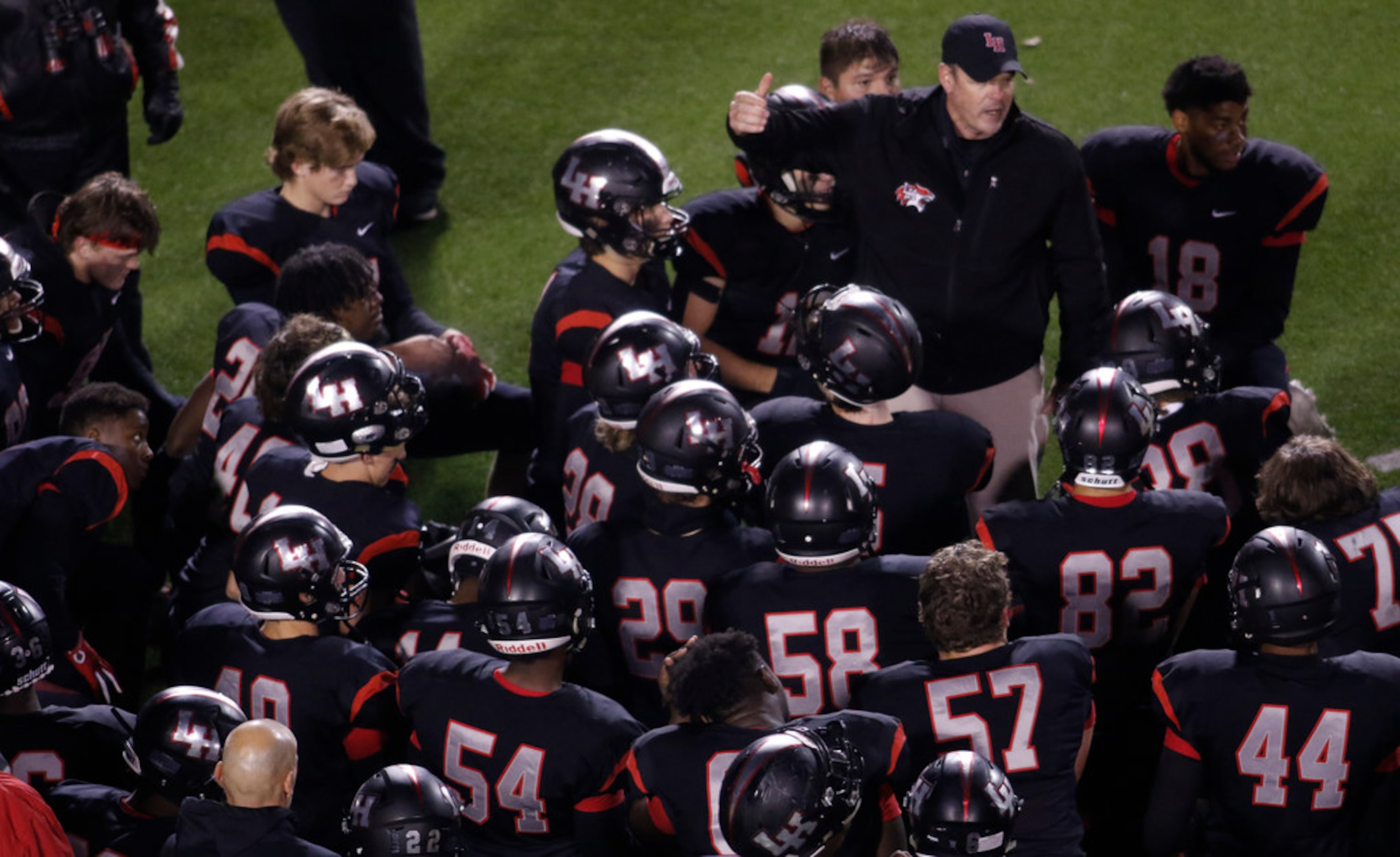 Lake Highlands head coach Lonnie Jordan shares words of encouragement with his team...