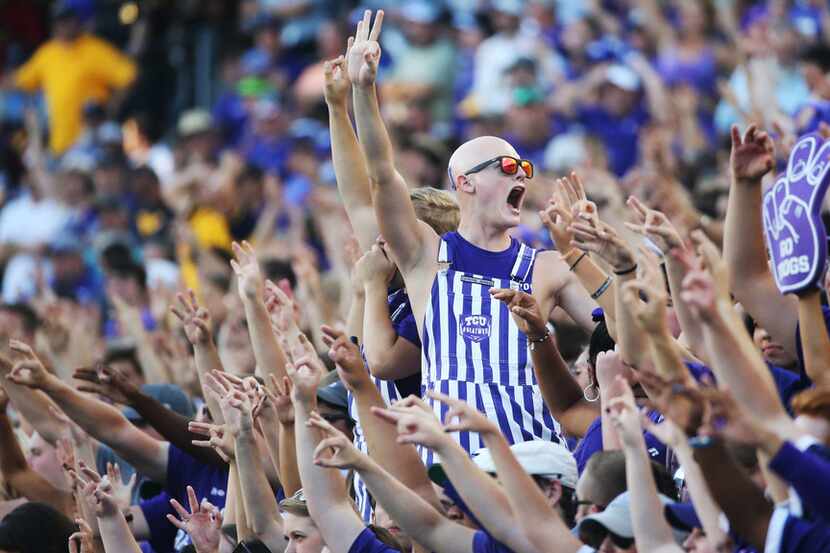 TCU fans cheer on their team in the fourth quarter during the West Virginia Mountaineers vs....