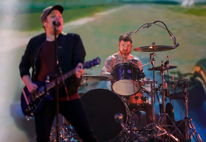 Fall Out Boy's lead vocalist and rhythm guitarist Patrick Stump (left) and drummer Andy...