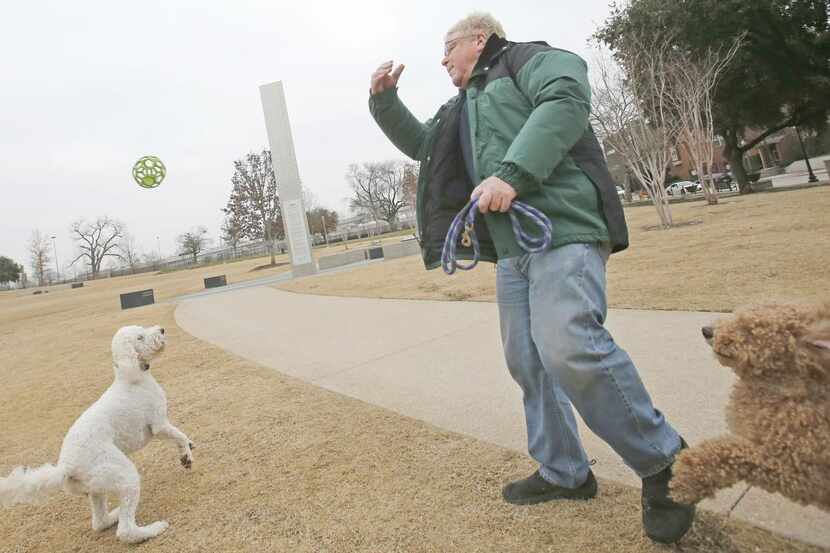 
Michael Trager and his dog play fetch at Griggs Park on Hugo Street in Uptown. While Dallas...