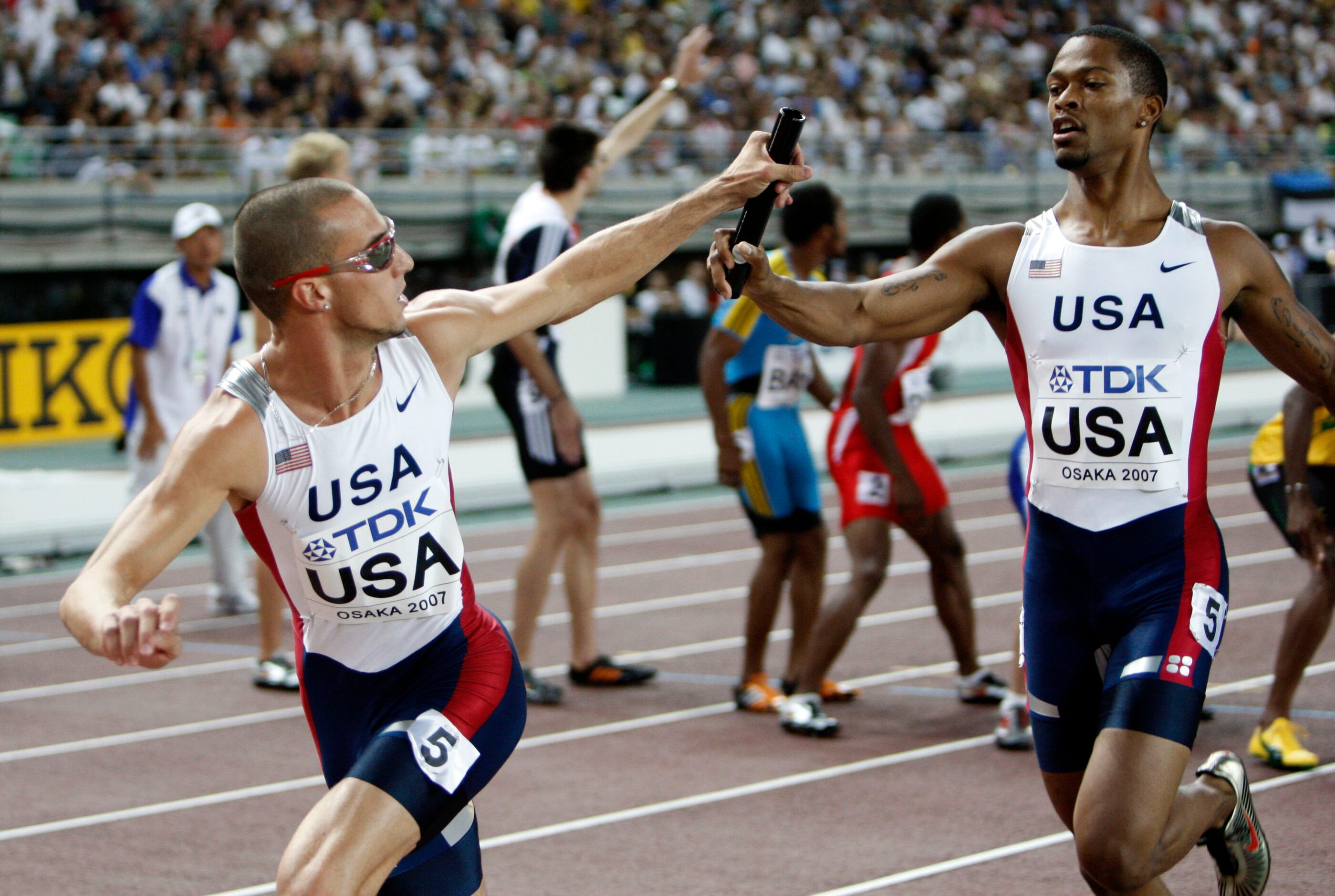 From 2007: United States' Jeremy Wariner, left, takes the baton from Darold Williamson as...