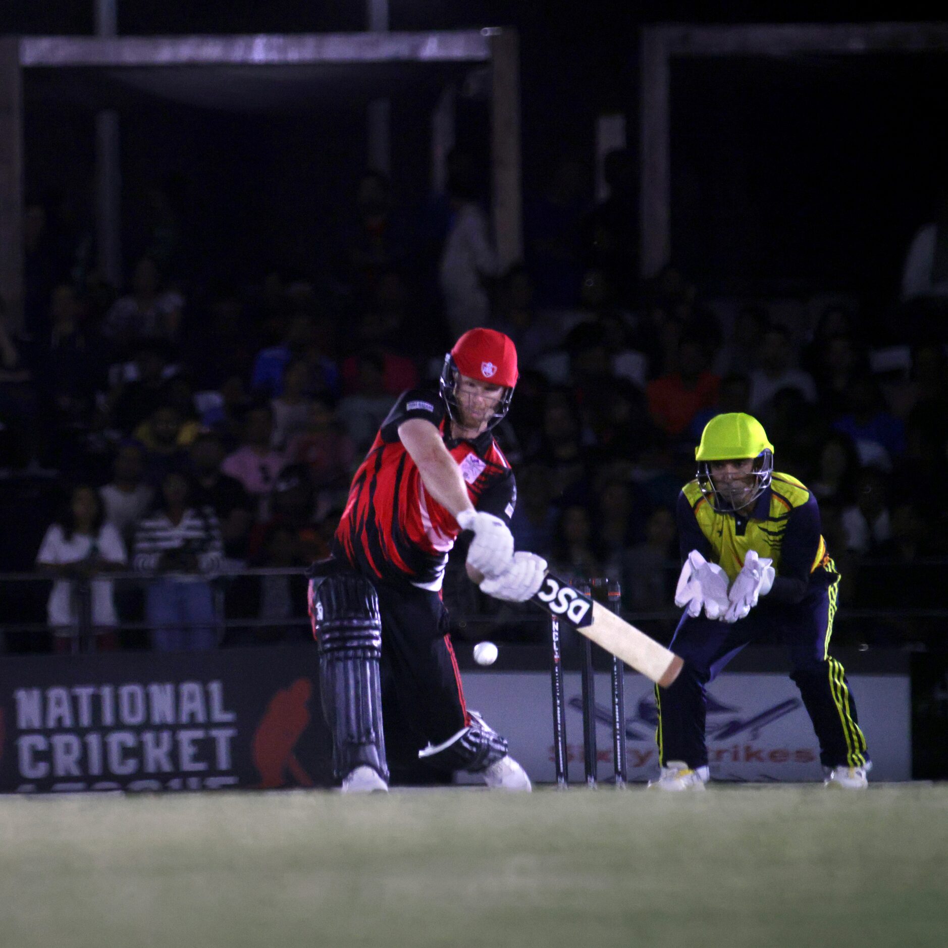 Atlanta player #50 Jimmy Neesham swings at the ball as The Chicago Cricket Club plays...