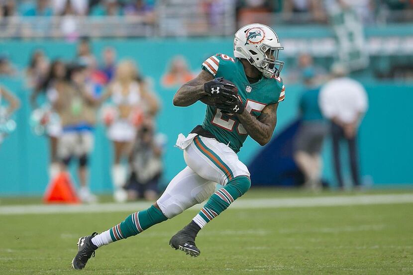 Miami Dolphins cornerback Xavien Howard returns an interception against the Bills. (Bill...