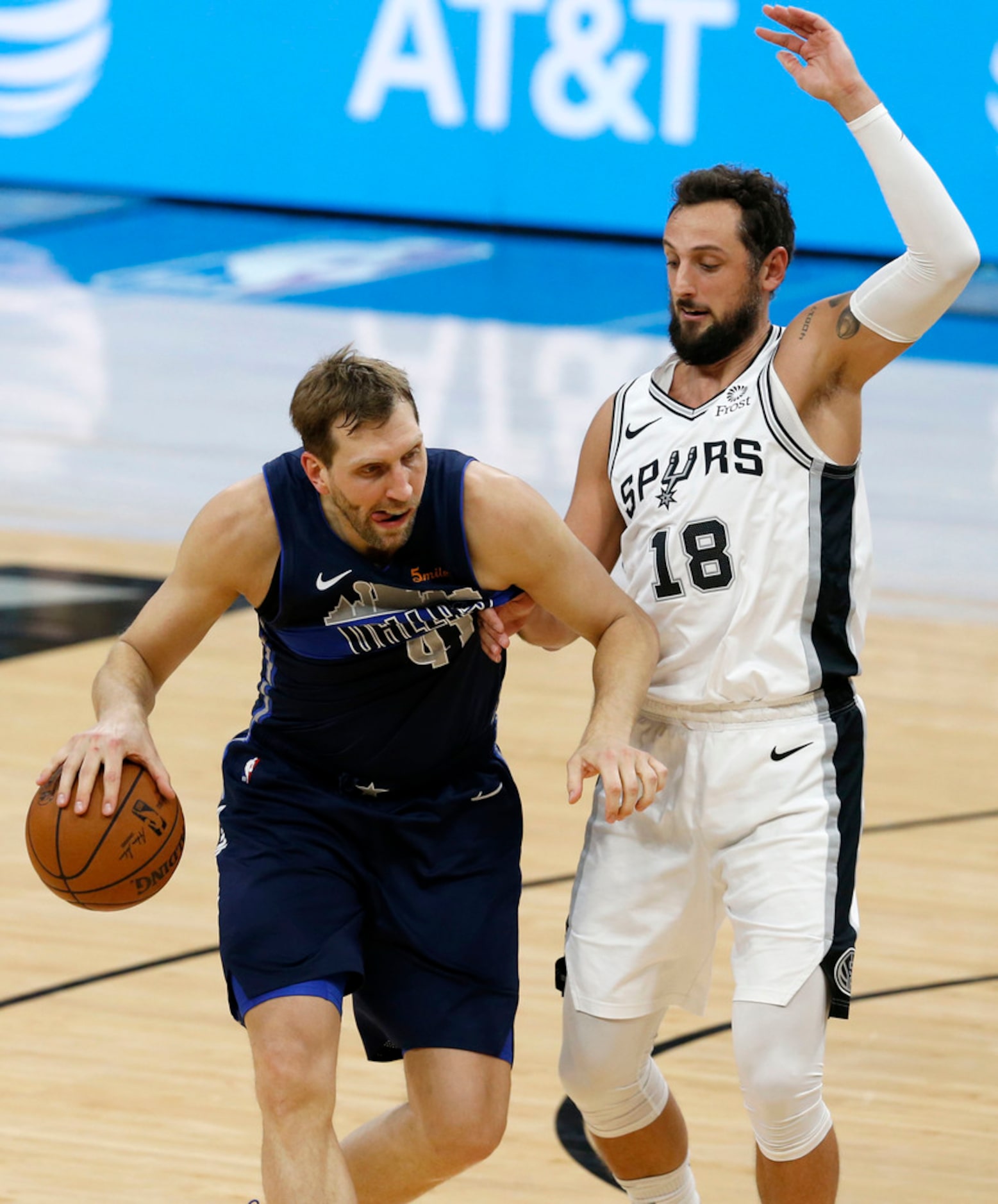 Dallas Mavericks forward Dirk Nowitzki (41) looks for room around San Antonio Spurs guard...