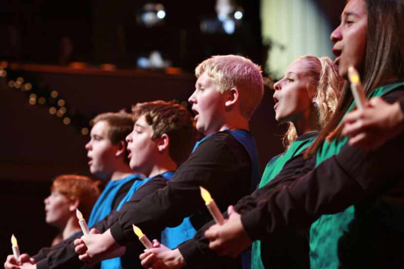 The Christmas Celebration Children's Choir performs with the Dallas Symphony Orchestra at...