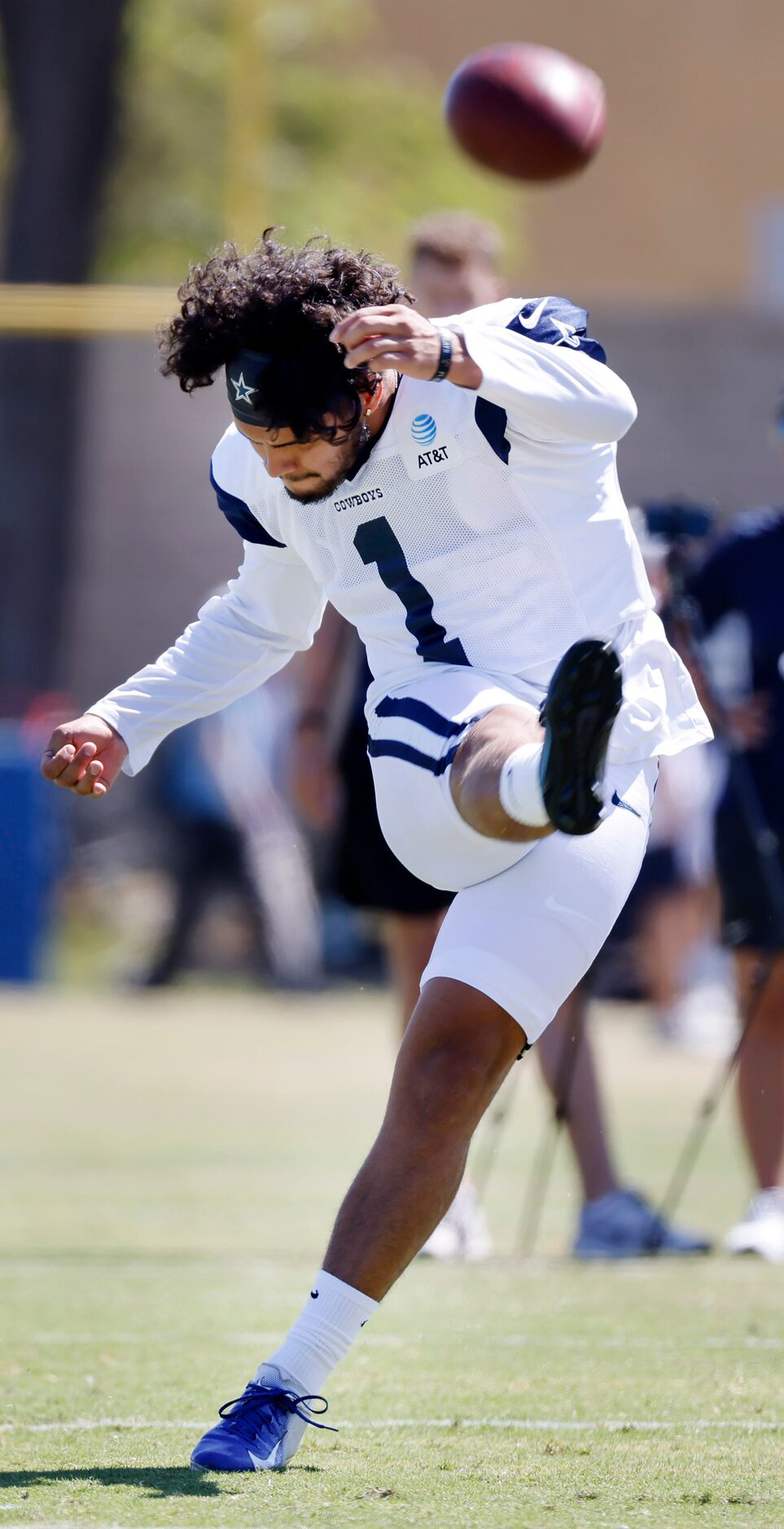 Dallas Cowboys kicker Lirim Hajrullahu (9) kicks field goals during training camp practice...