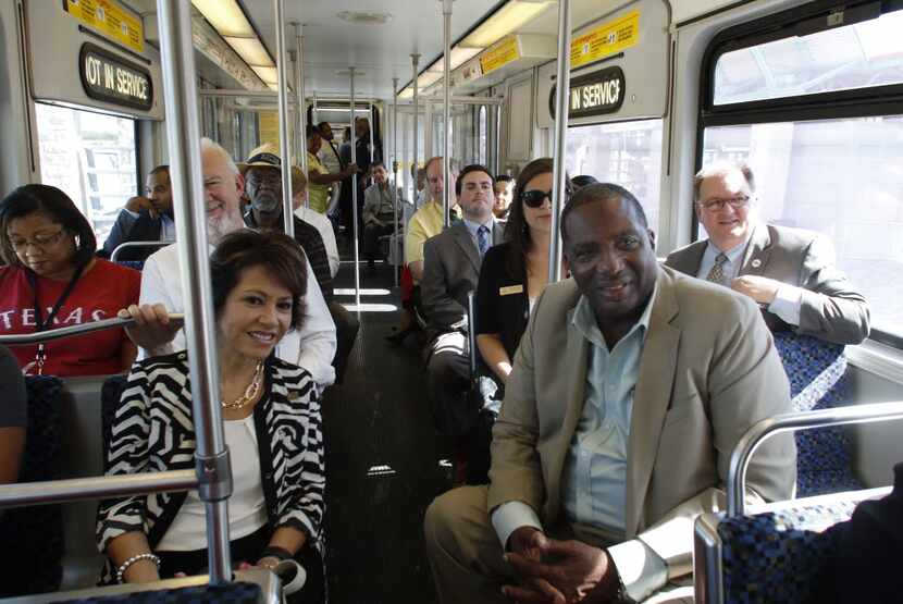 Sen. Royce West, D-Dallas, right, a major advocate for the DART Blue Line extension to...