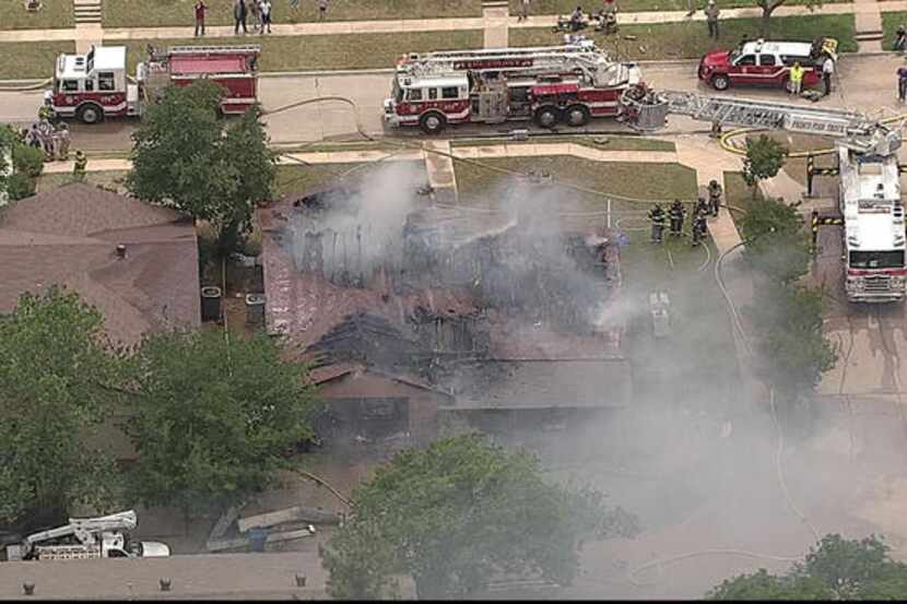 A firefighter was injured and a family escaped a house fire Wednesday in The Colony.