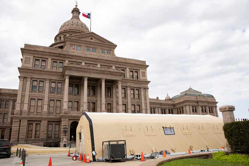 Tents set up for rapid COVID tests in front of the Texas Capitol in Austin on Wednesday,...