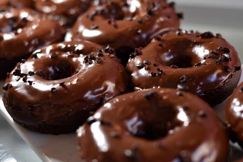 Quadruple chocolate donuts from Glazed Donut Works, during a revealing of their new donuts,...