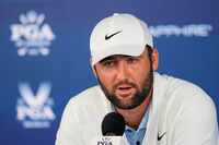 Scottie Scheffler speaks during a news conference at after the second round of the PGA...
