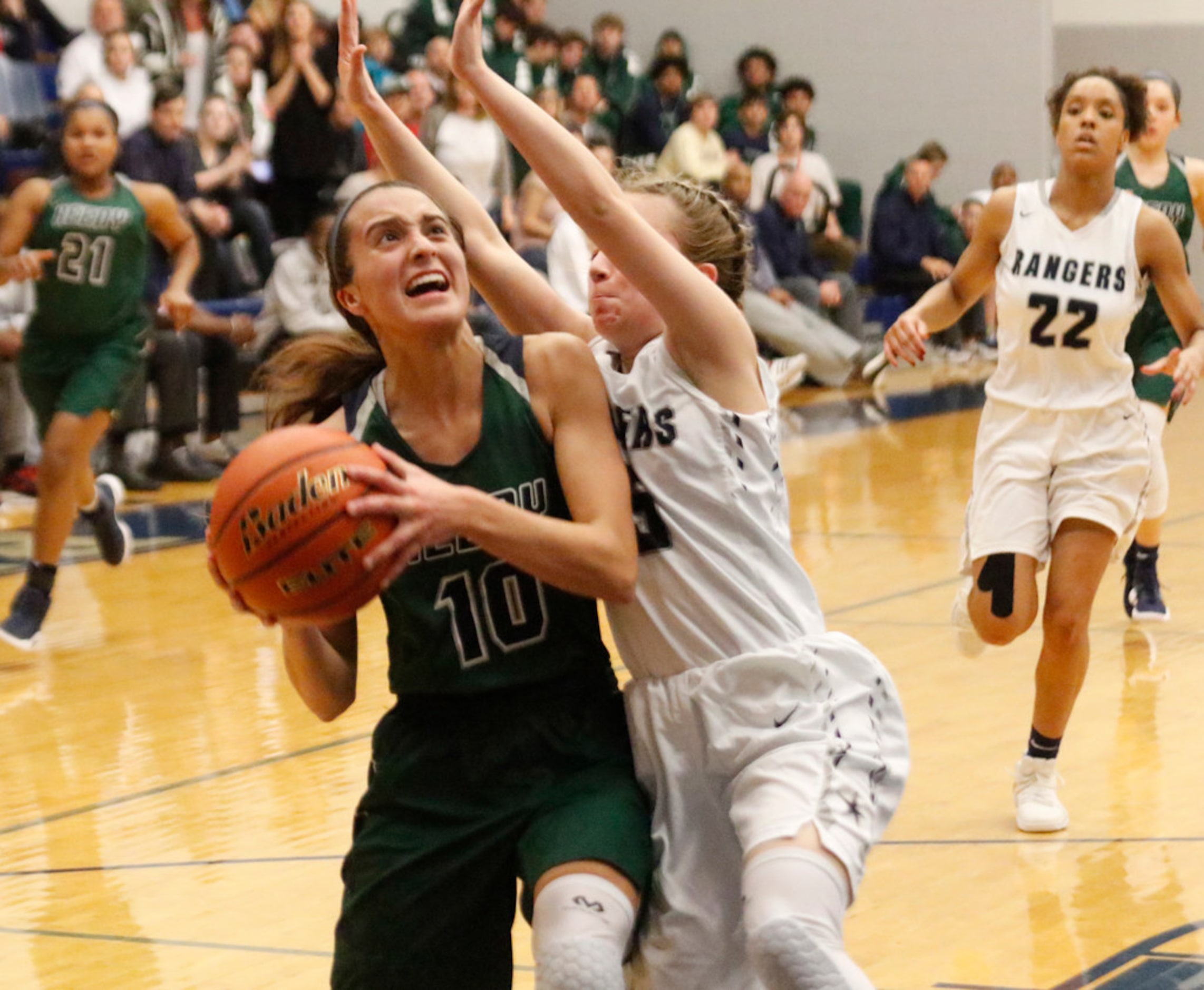 Frisco Reedy's Sophia Thomas (10) tries a layup against    Frisco Lone Star's Makenna Long...