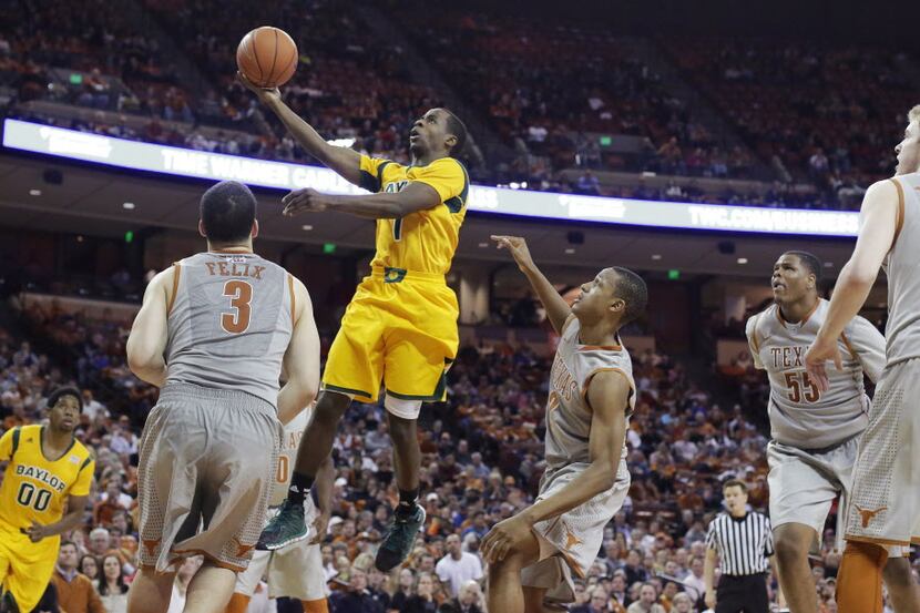 Baylor's Kenny Chery (1) shoots over Texas' Javan Felix (3) during the second half of an...