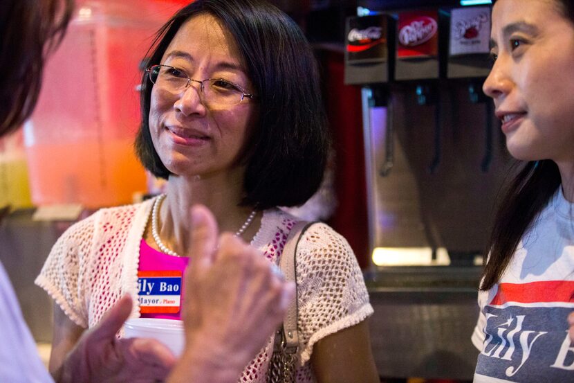 Plano mayoral candidate Leilei "Lily" Bao talks with supporters at an election night...