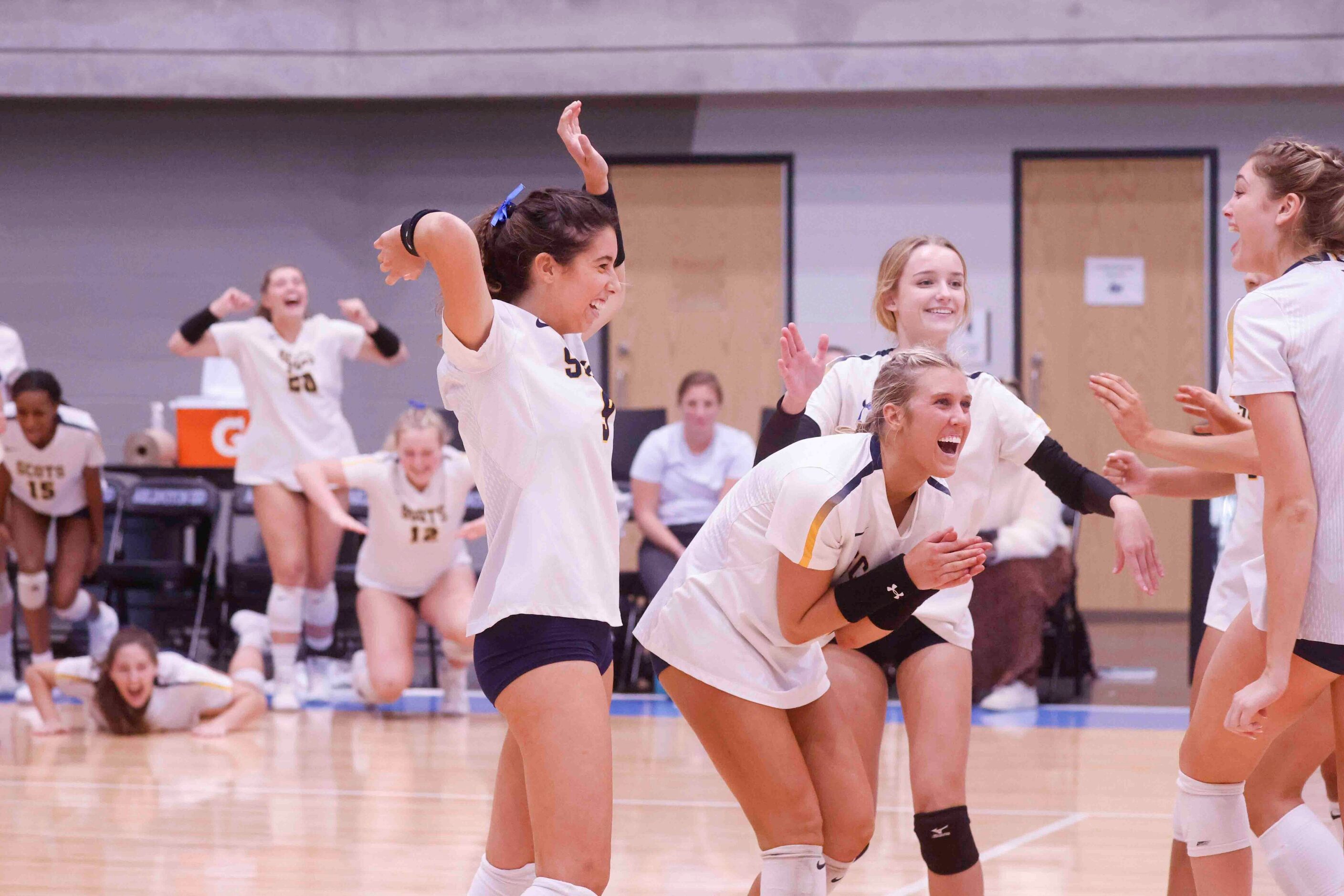 Highland Park players celebrate a point during the last period against Flower Mound during a...