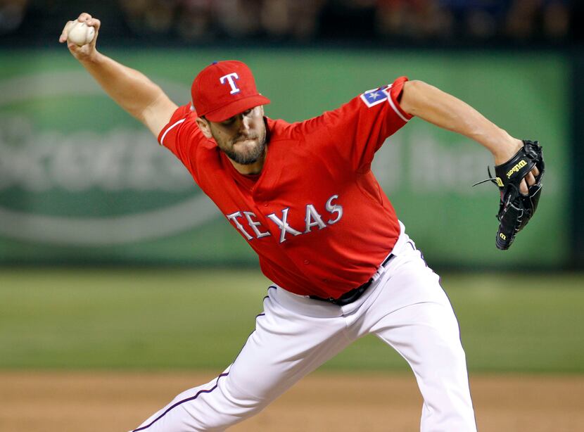 Texas Rangers relief pitcher Darren O'Day (56) throws a pitch during ninth inning MLB...