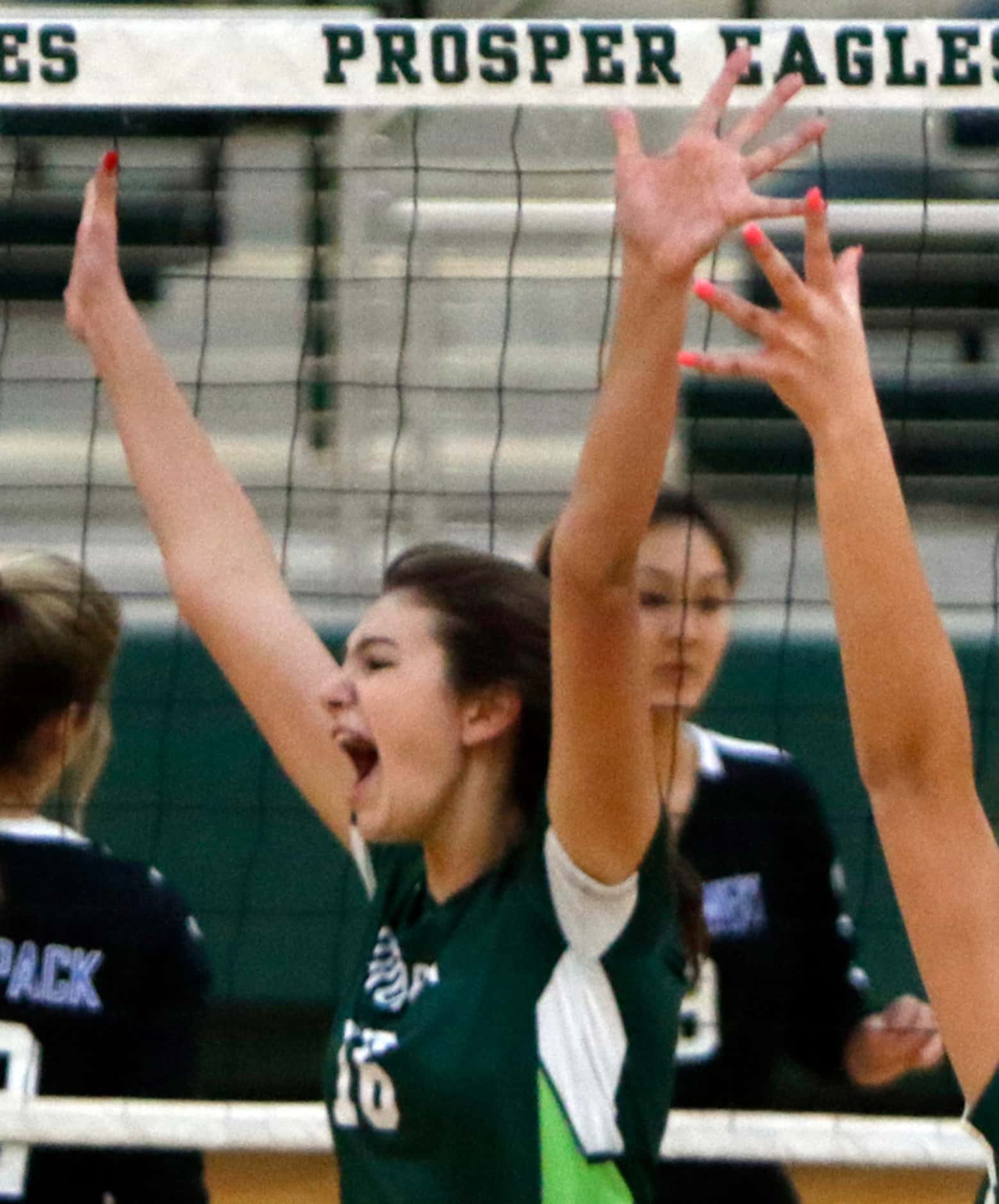 Prosper's Taylor Youtsey (16) exults after blocking the shot of a Plano West player during...