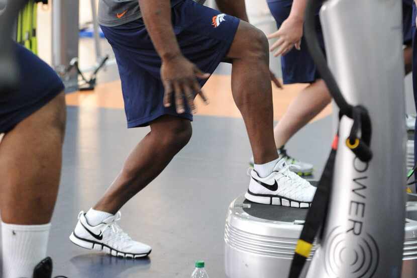 A photo provided by the Denver Broncos is of defensive end DeMarcus Ware working out during...