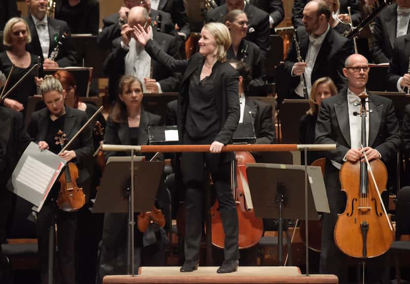 Conductor Ruth Reinhardt turns the audience after the third movement of Lutoslawski's...