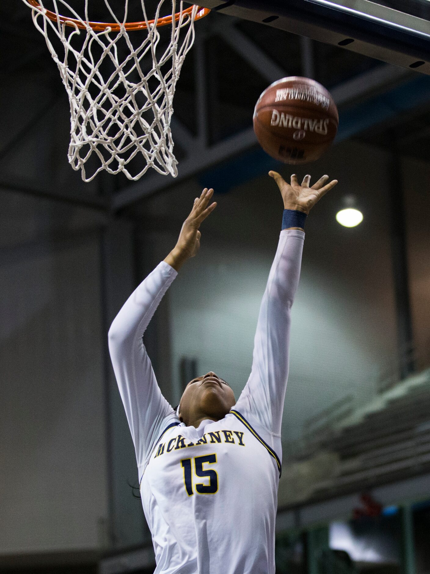 McKinney guard Taylor Jackson (15) goes up for a shot during the fourth quarter of a UIL 6A...