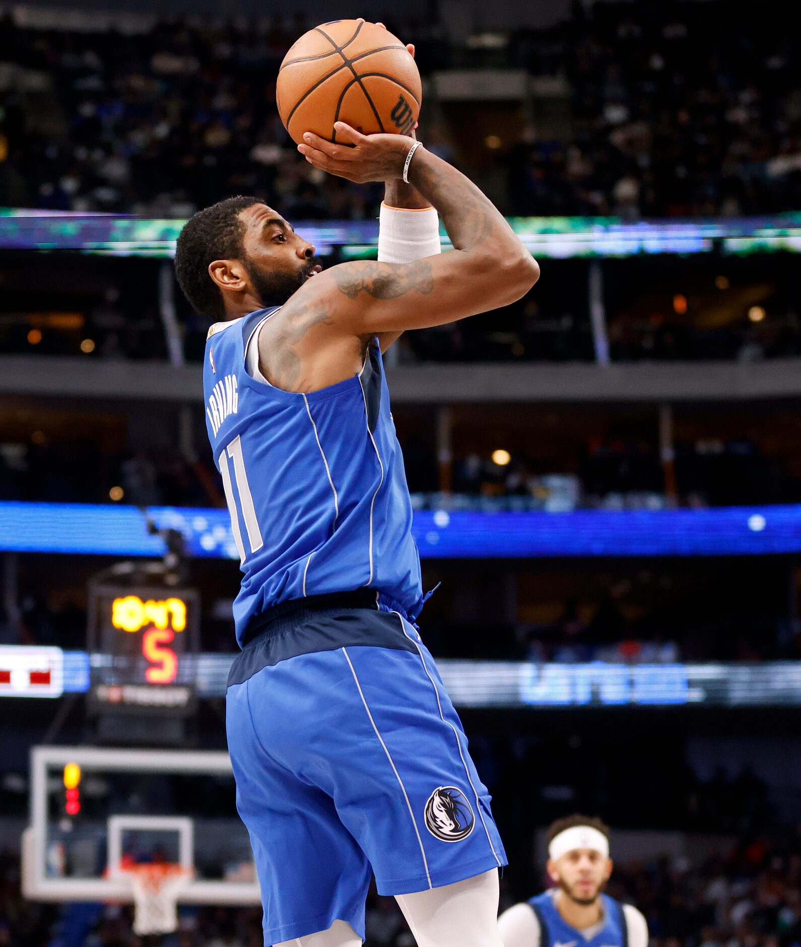 Dallas Mavericks guard Kyrie Irving (11) takes a first half shot against the New Orleans...