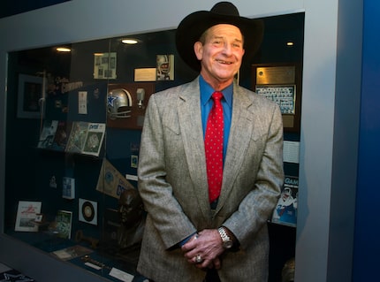 FILE - Walt Garrison talks to reporters at a reception before the induction for the 2013...