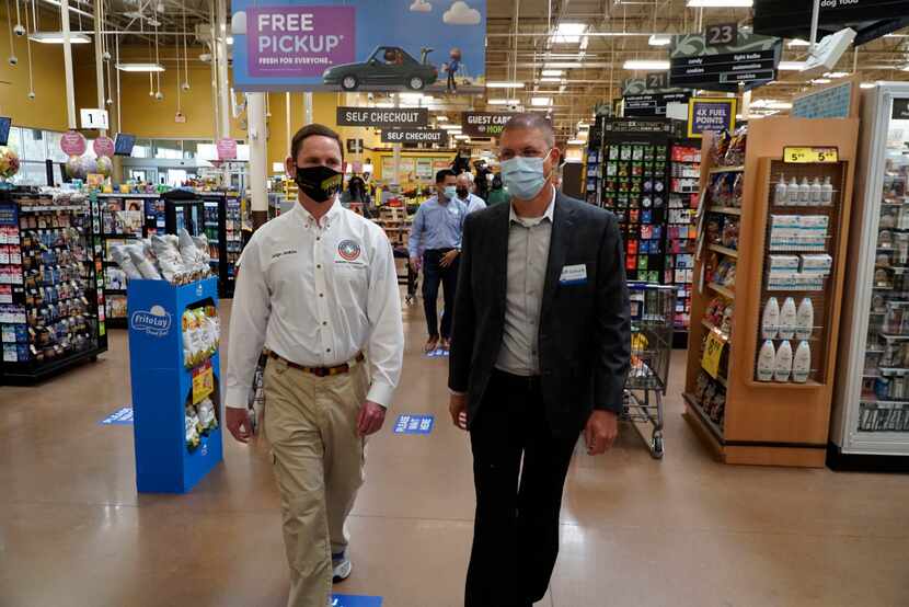 Clay Jenkins and Kroger Health Director (Dallas Division) Jeff Loesch at the Kroger store...