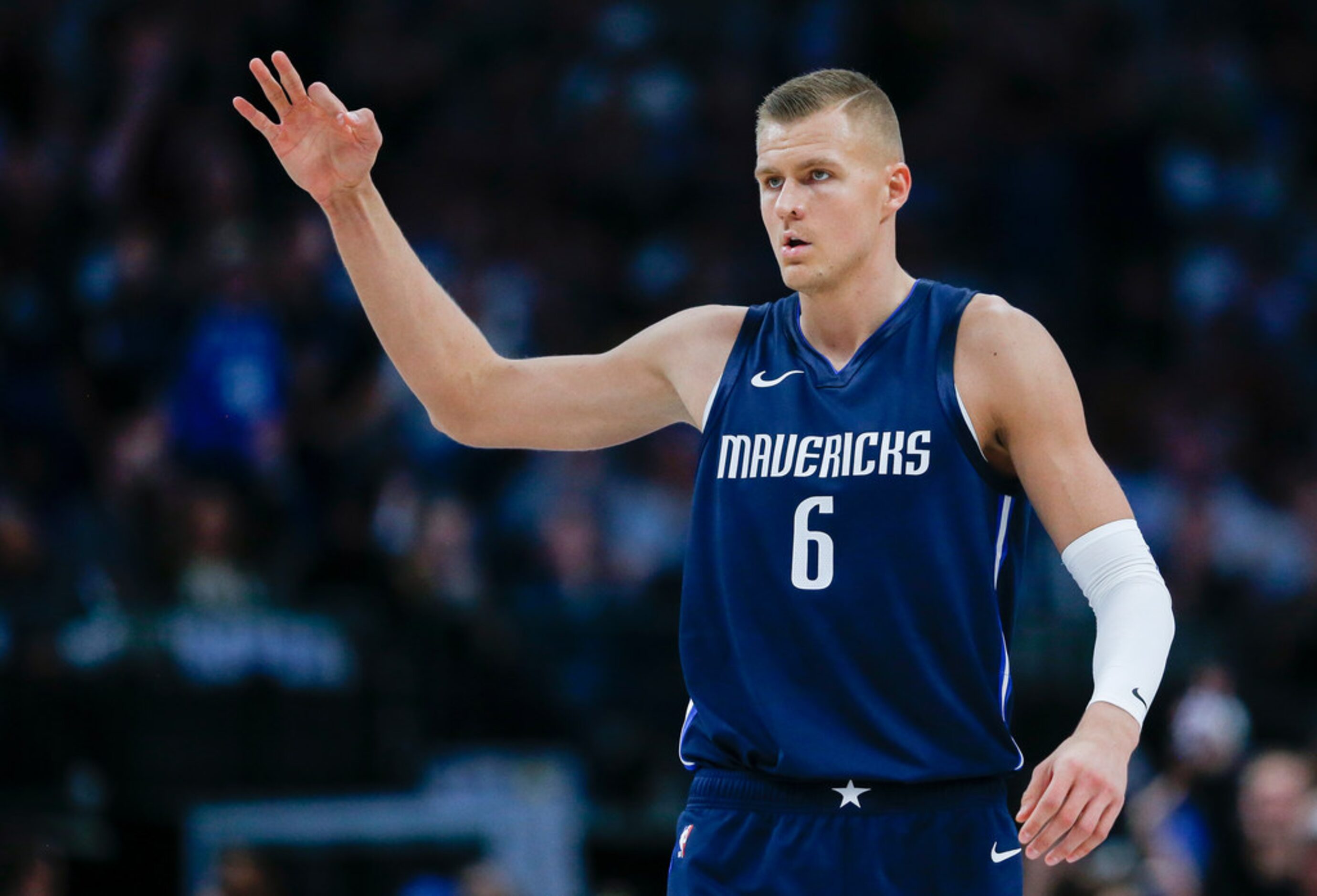 Dallas Mavericks forward Kristaps Porzingis (6) celebrates a play during the second quarter...